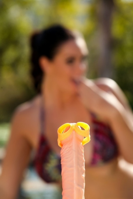 Hot busty pornstar Alison Tyler om hot bikini playing with her dildo outdoors
